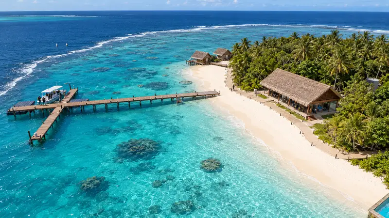 The dive centre by the west beach with the jetty and the reef
